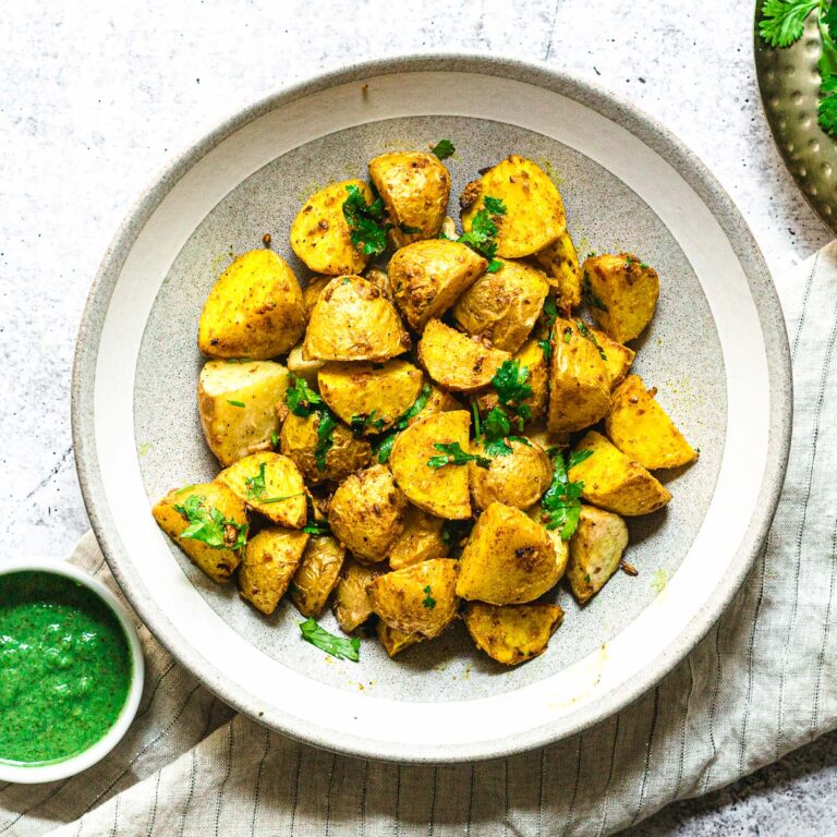 air fryer potatoes with masala served with cilantro chutney