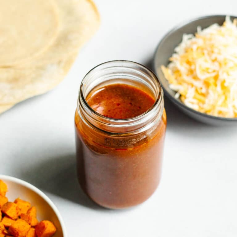 homemade enchilada sauce in glass jar